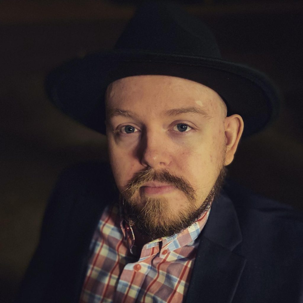 Headshot of Justin Rayner